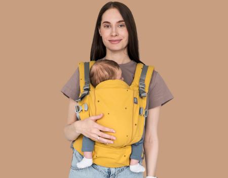imagen que muestra con detalle la ergonomia de las mochilas de porteo love and carry one con recien nacido